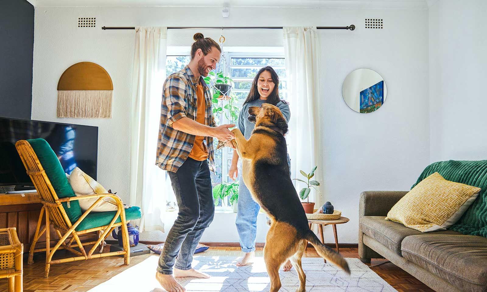 Couple dancing with german shepherd